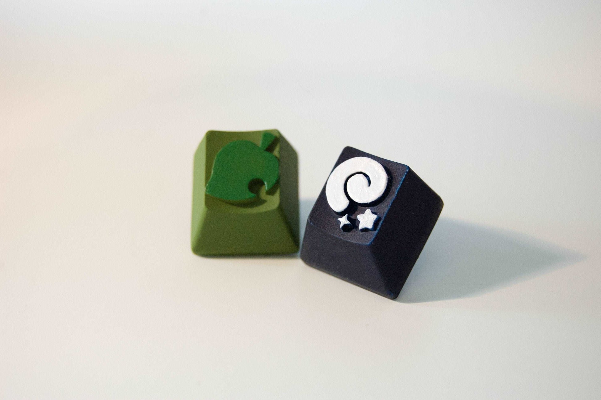 AC Inspired Artisan Keycaps set of 2