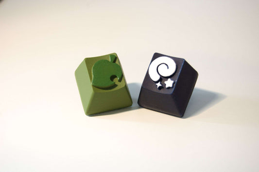 AC Inspired Artisan Keycaps set of 2